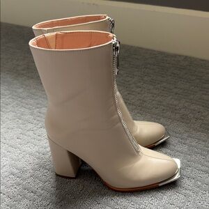 Chic Cream Heeled Boots with Silver Accents